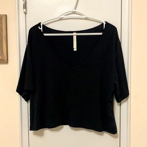 The Group by Babaton Black Cropped V-Neck Tee (US M). Also available in (US S)